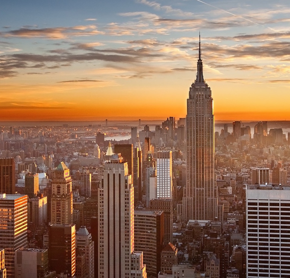 photo of New York City skyline featuring the Empire State Building, the Woolworth, and others