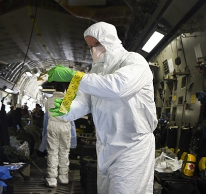 photo of man in hazmat suit
